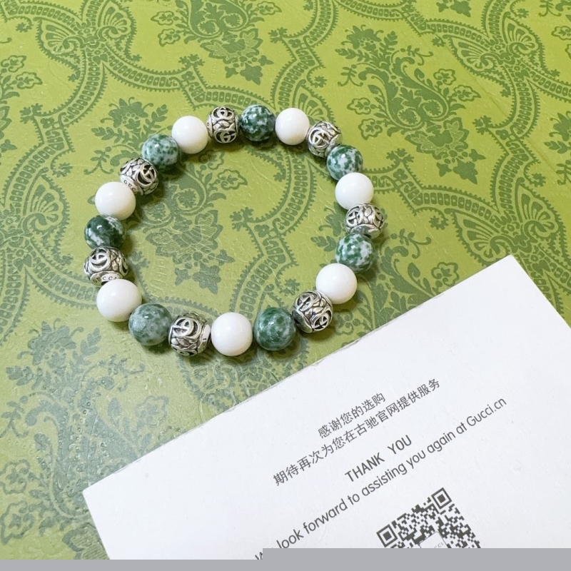 G*u*i bracelets